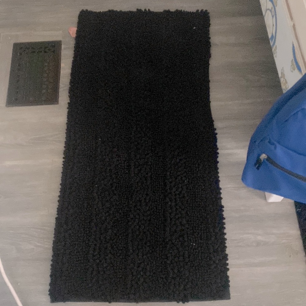A black rug